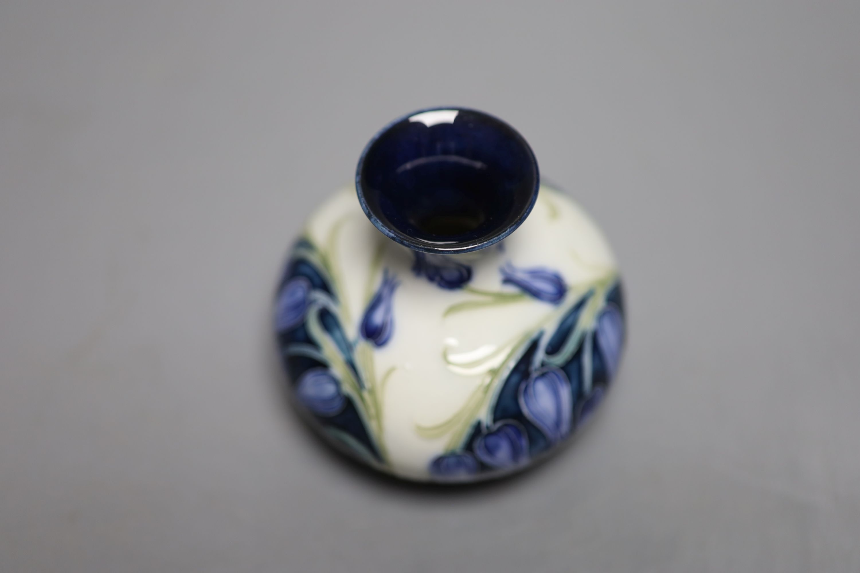 A Moorcroft for MacIntyre florian ware posy vase, some restoration